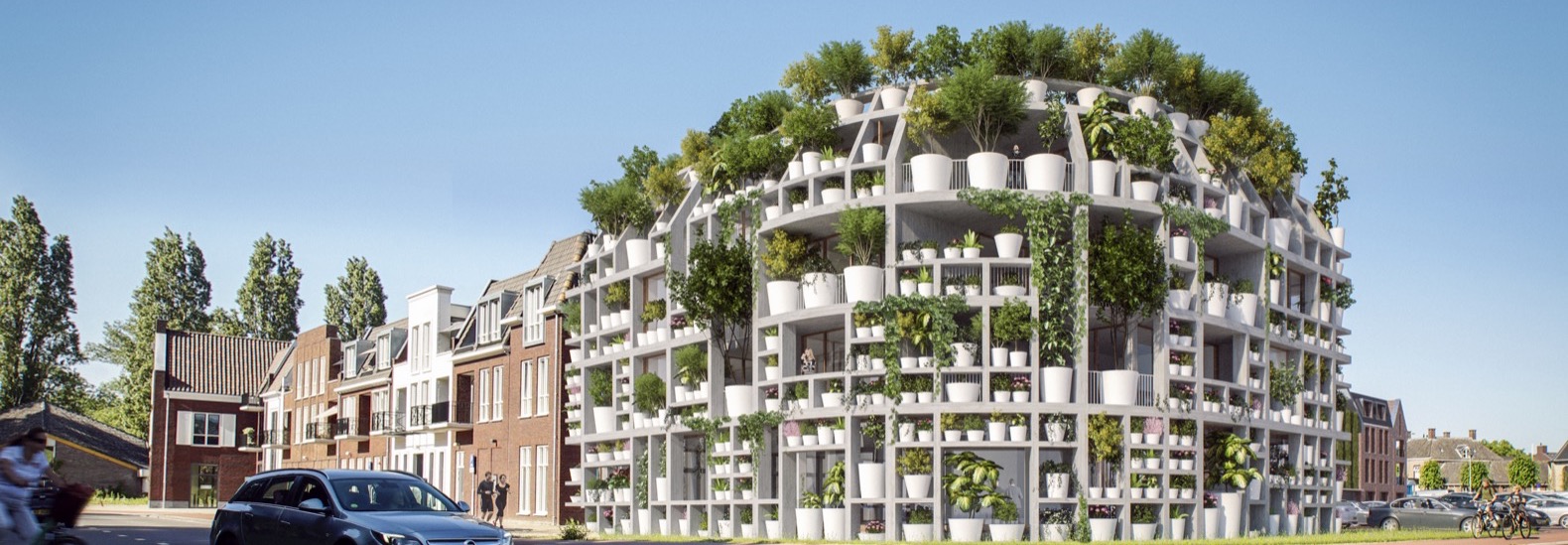 vasos de plantas na fachada em edifício na Holanda